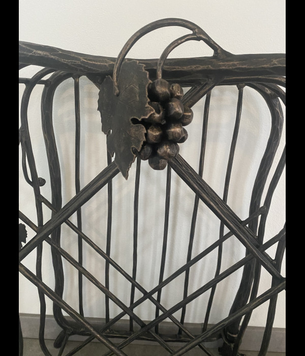 A wrought iron wine cabinet