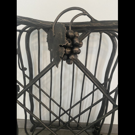 A wrought iron wine cabinet