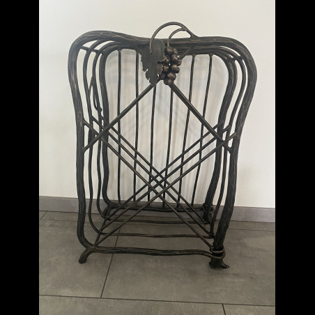 A wrought iron wine cabinet