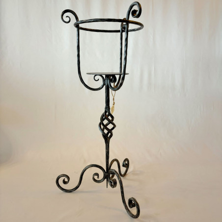A wrought iron flowerpot