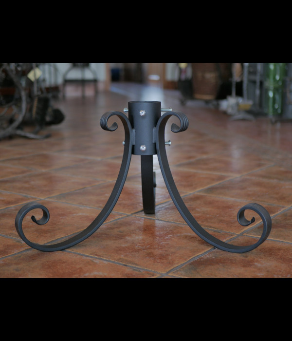 A wrought iron tree stand