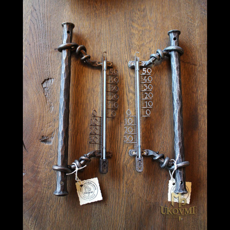 A wrought iron thermometer