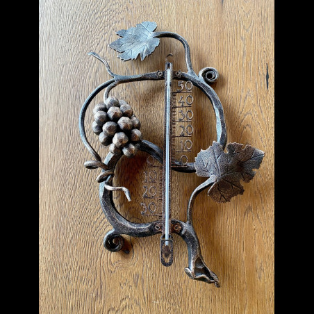 A wrought iron thermometer