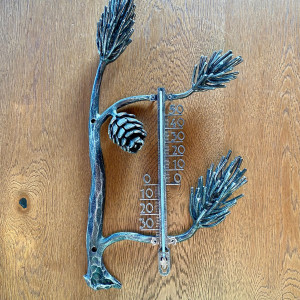 A wrought iron thermometer