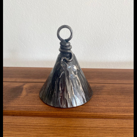 A wrought iron bell