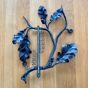 A wrought iron thermometer Oak