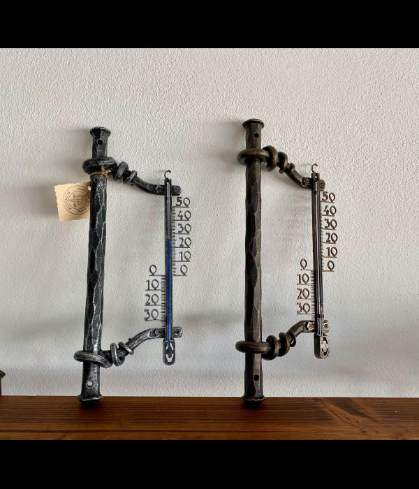A wrought iron thermometer A wrought iron thermometer