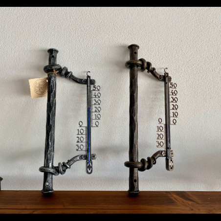 A wrought iron thermometer