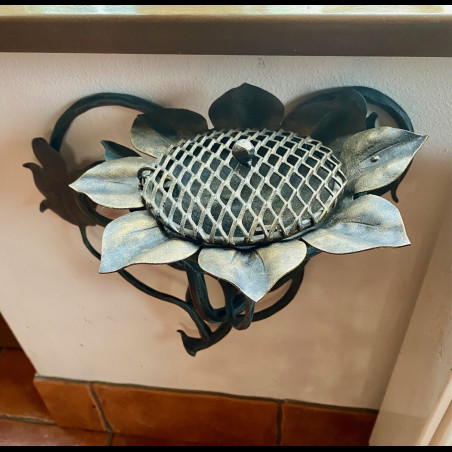 A wrought iron ashtray