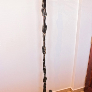 A wrought iron hanger
