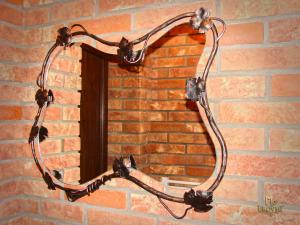 A mirror with a wrought iron frame (NBK-307)
